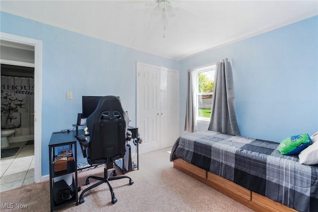 7377 Sierra Madre Trl, Boardman, OH 44512 - carpeted bedroom with a closet, a ceiling fan, and baseboards