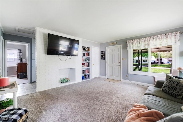 7377 Sierra Madre Trl, Boardman, OH 44512 - carpeted living area with crown molding, built in features, and baseboards