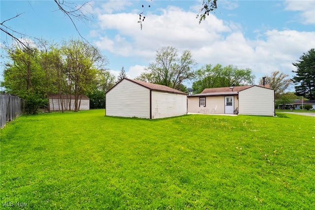 7377 Sierra Madre Trl, Boardman, OH 44512 - view of yard with fence and an outdoor structure
