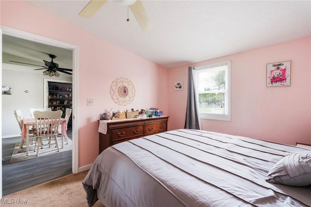7377 Sierra Madre Trl, Boardman, OH 44512 - carpeted bedroom with a ceiling fan and baseboards