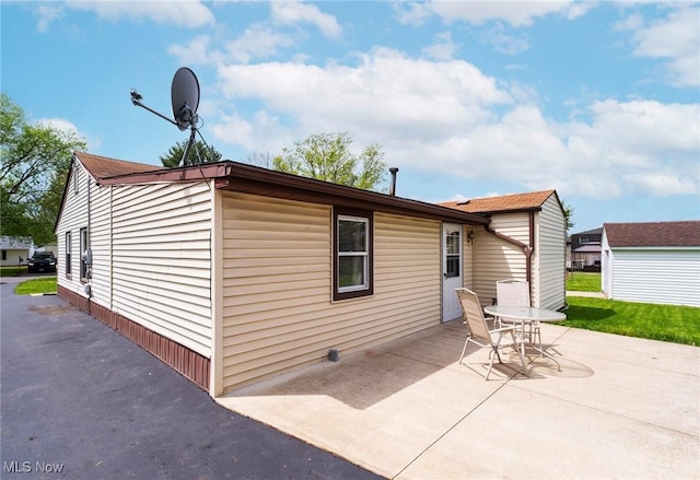 7377 Sierra Madre Trl, Boardman, OH 44512 - back of property with a patio area
