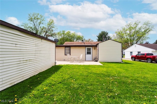7377 Sierra Madre Trl, Boardman, OH 44512 - back of house with a lawn and a patio area