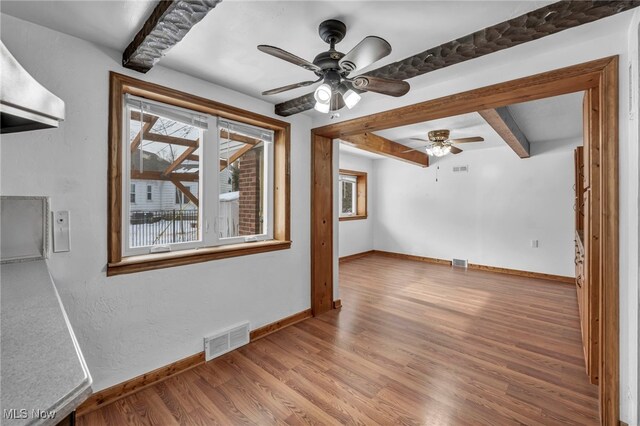24118 E Baintree Rd, Beachwood, OH 44122 - additional living space featuring baseboards, ceiling fan, beamed ceiling, and visible vents