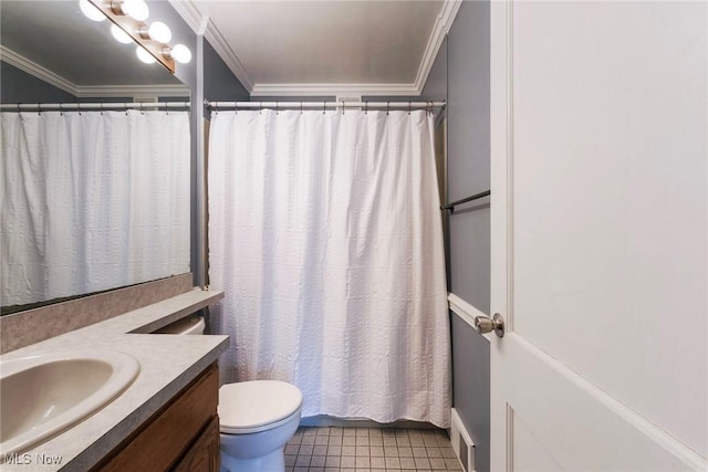 bathroom featuring vanity, crown molding, tile patterned flooring, and toilet