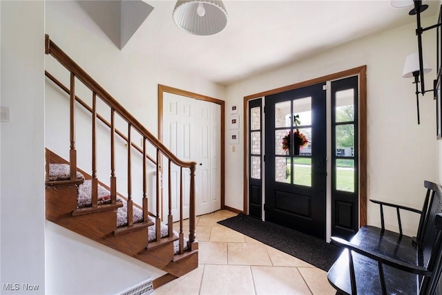 8459 Four Seasons Trl, Poland, OH 44514 - tiled entryway with stairway