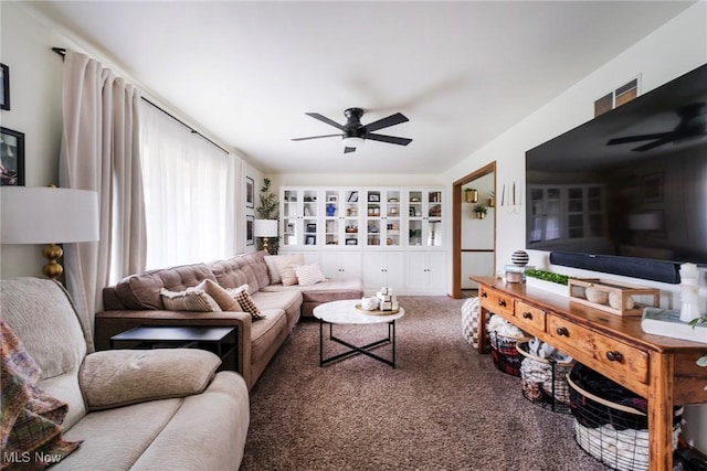8459 Four Seasons Trl, Poland, OH 44514 - living area with carpet flooring and ceiling fan