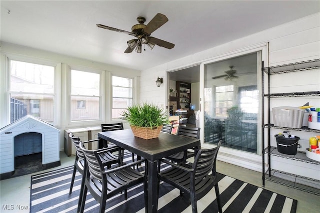 8459 Four Seasons Trl, Poland, OH 44514 - sunroom / solarium featuring a ceiling fan and outdoor dining area