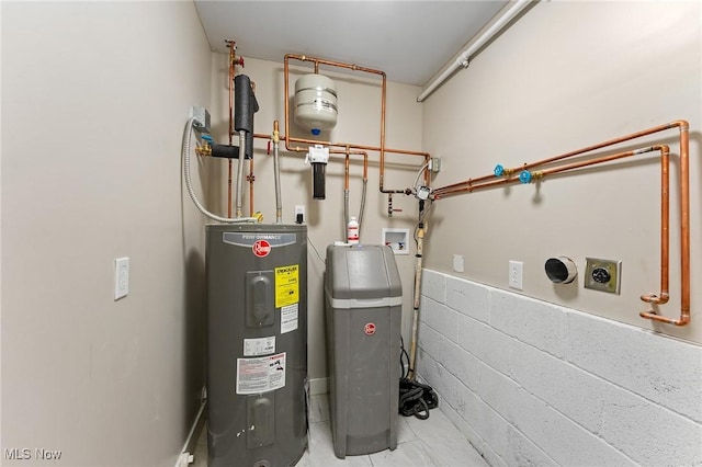 utility room featuring electric water heater
