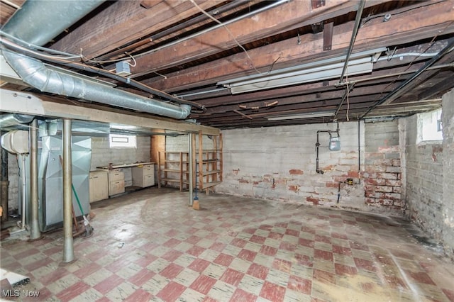 basement featuring tile patterned floors