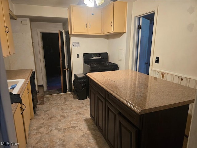 kitchen featuring a center island, white cabinetry, ceiling fan, and black range with gas cooktop