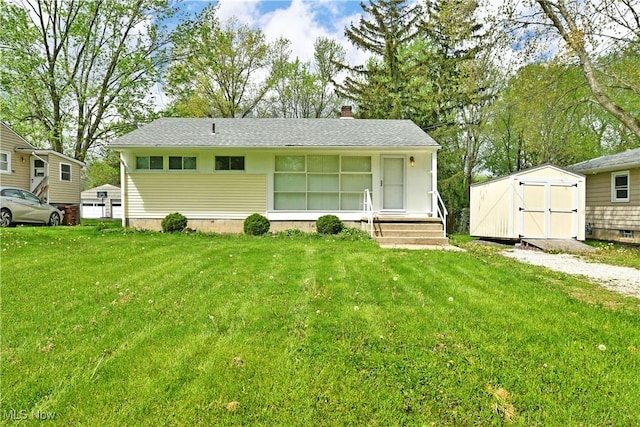 5071 Copeland Ave NW, Warren, OH 44483 - single story home with an outbuilding, a chimney, a front lawn, and a shed