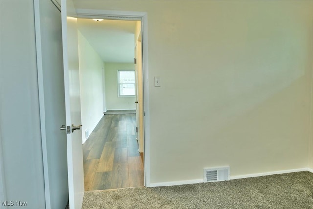 5071 Copeland Ave NW, Warren, OH 44483 - hallway with baseboards, carpet flooring, and visible vents