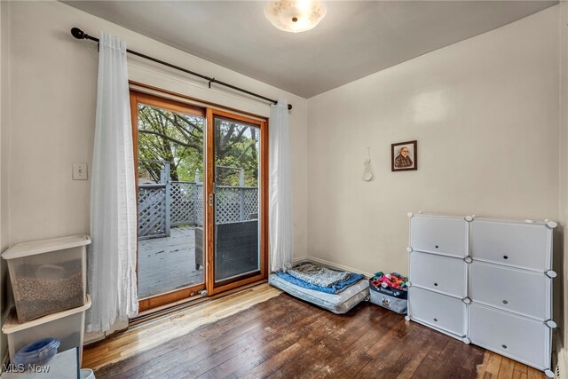 entryway with hardwood / wood-style floors