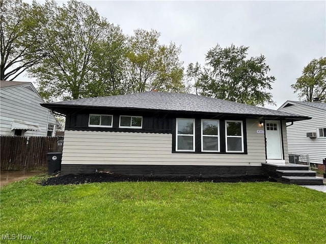 4362 W 155th St, Cleveland, OH 44135 - single story home featuring fence, a shingled roof, and a front yard
