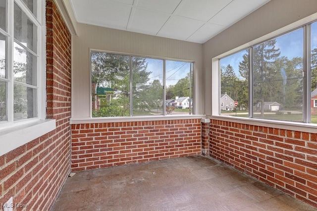 23267 Marion Rd, North Olmsted, OH 44070 - unfurnished sunroom featuring brick wall