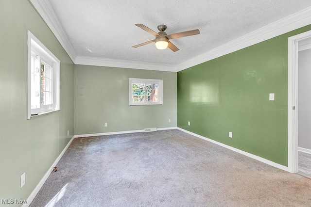 23267 Marion Rd, North Olmsted, OH 44070 - carpeted empty room with baseboards, ceiling fan, ornamental molding, and a textured ceiling