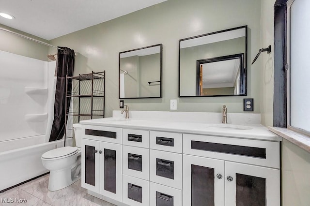 23267 Marion Rd, North Olmsted, OH 44070 - full bathroom with a sink, toilet, double vanity, and shower / bath combination with curtain