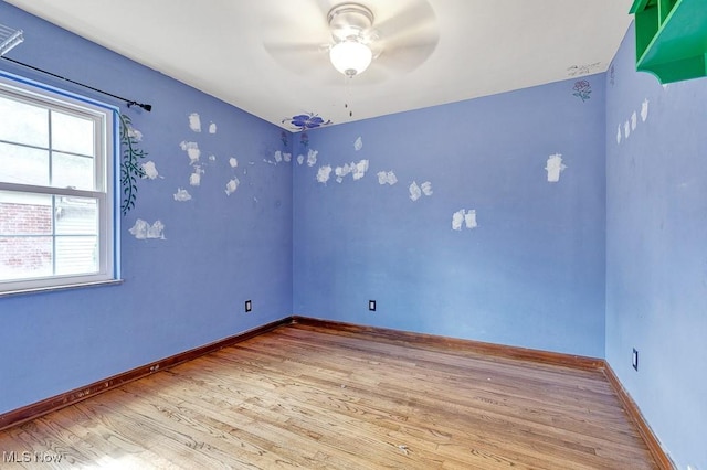 23267 Marion Rd, North Olmsted, OH 44070 - unfurnished room featuring baseboards, ceiling fan, and wood finished floors