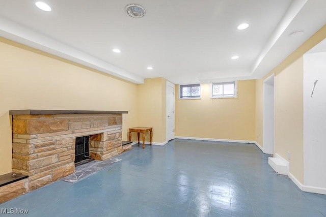 23267 Marion Rd, North Olmsted, OH 44070 - below grade area featuring baseboards, a fireplace, and recessed lighting