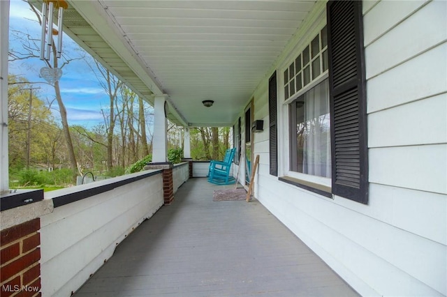 exterior space featuring covered porch