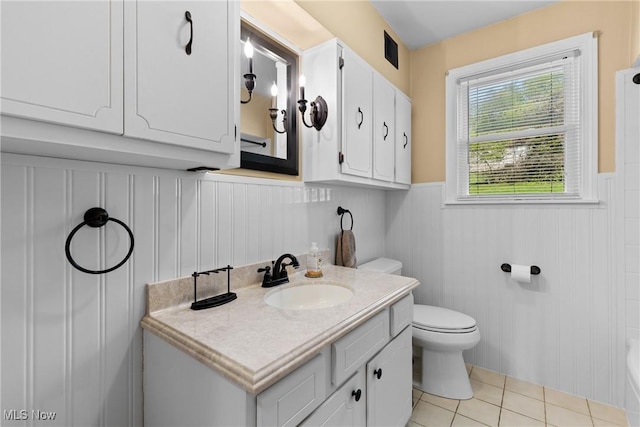 23 Walnut St, Rayland, OH 43943 - bathroom featuring vanity, tile patterned flooring, a wainscoted wall, and toilet