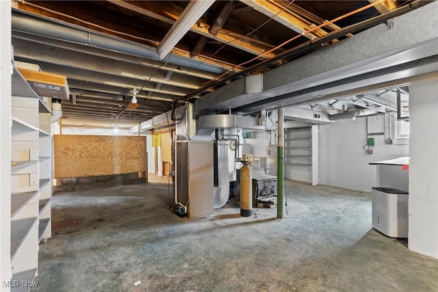 23 Walnut St, Rayland, OH 43943 - unfinished below grade area featuring heating unit