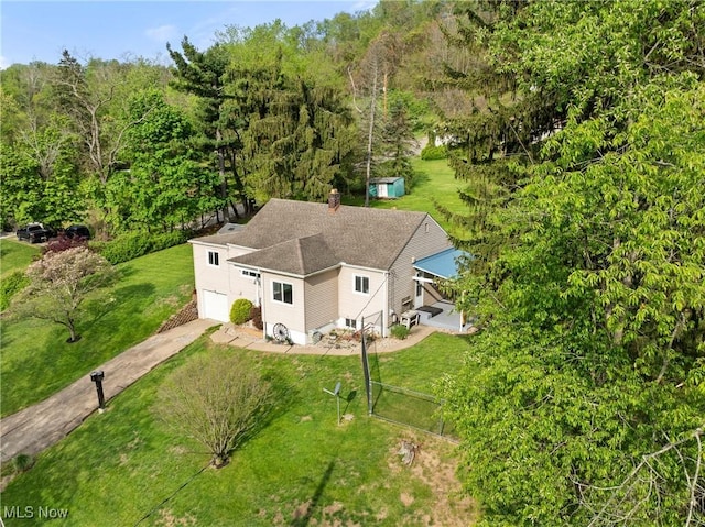 23 Walnut St, Rayland, OH 43943 - birds eye view of property featuring a wooded view