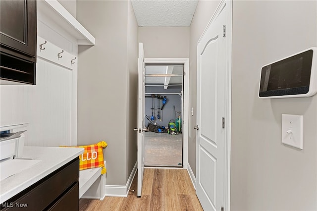 interior space with light wood-type flooring and baseboards