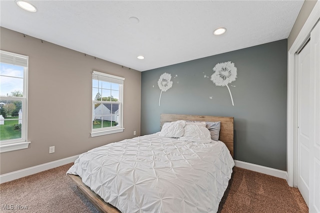 bedroom with baseboards, carpet, and recessed lighting
