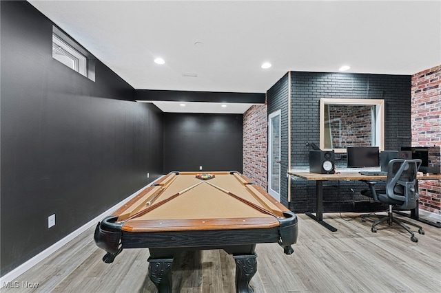 recreation room with baseboards, brick wall, billiards, and wood finished floors