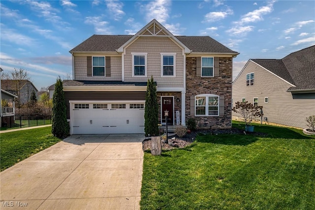 craftsman house featuring fence, a front yard, stone siding, an attached garage, and driveway