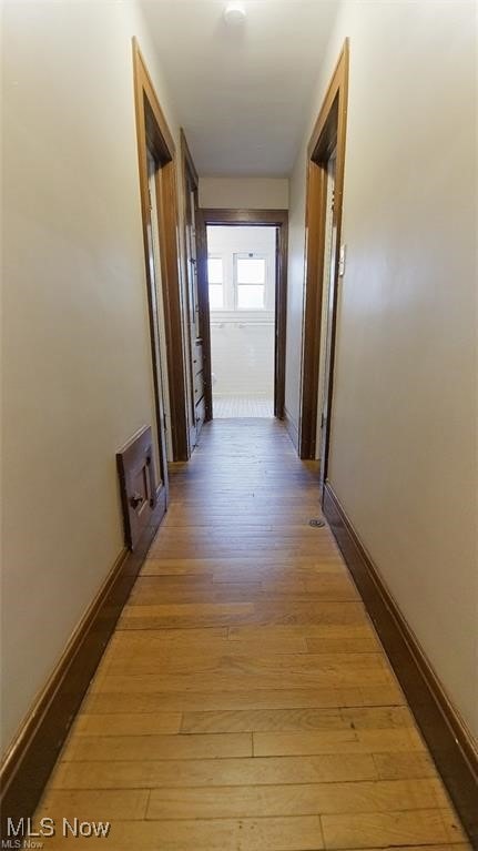 3996 Bluestone Rd, Cleveland Heights, OH 44121 - corridor with baseboards and light wood-type flooring