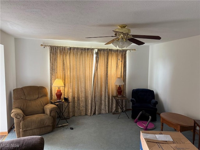 919 19th St, Vienna, WV 26105 - living area featuring carpet, a textured ceiling, and a ceiling fan
