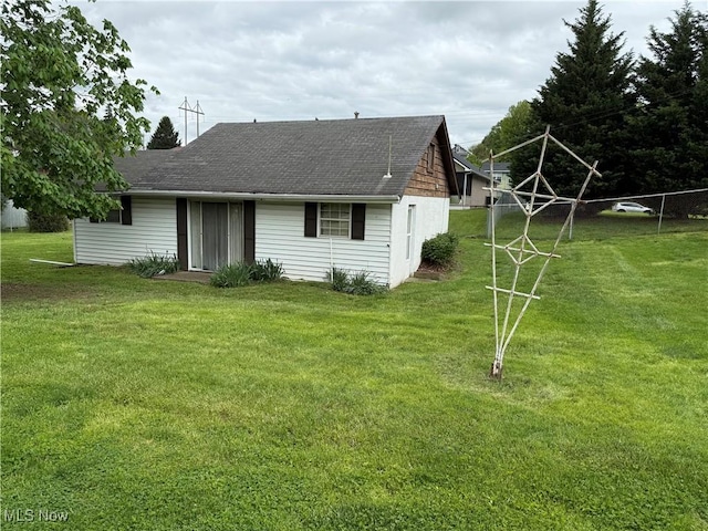 919 19th St, Vienna, WV 26105 - rear view of property with roof with shingles