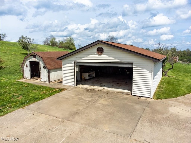 detached garage with a shed