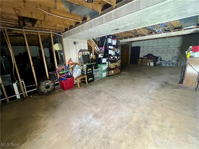 unfinished basement with visible vents