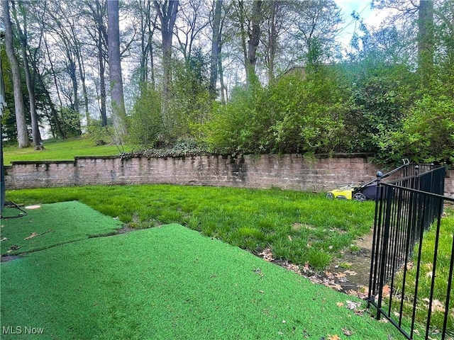 view of yard featuring fence