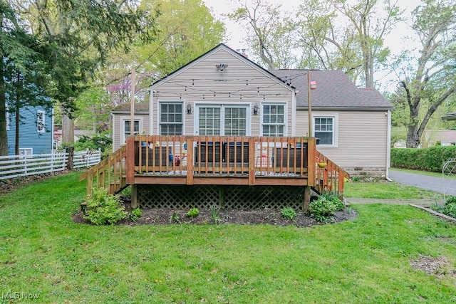 7599 Fairview Ave, Mentor, OH 44060 - rear view of property with fence, a wooden deck, a yard, and roof with shingles