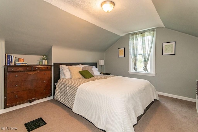 7599 Fairview Ave, Mentor, OH 44060 - carpeted bedroom featuring baseboards, lofted ceiling, and visible vents