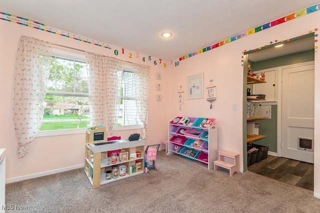 7599 Fairview Ave, Mentor, OH 44060 - game room with carpet floors, baseboards, recessed lighting, and a wealth of natural light