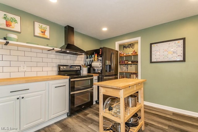 7599 Fairview Ave, Mentor, OH 44060 - kitchen with wall chimney range hood, range with two ovens, open shelves, wood counters, and white cabinetry
