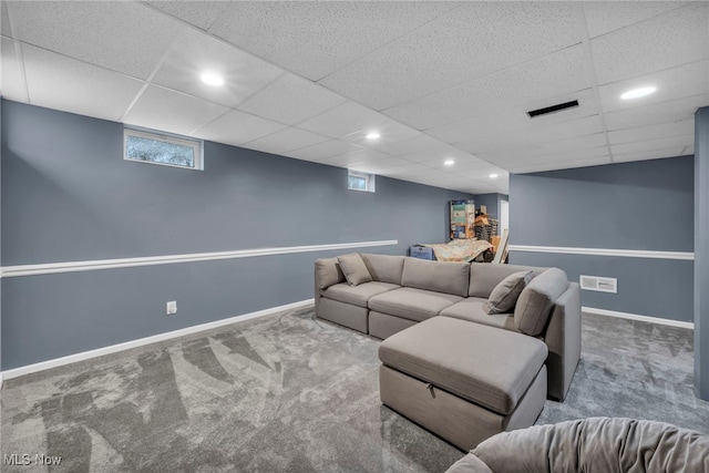 carpeted living room featuring a healthy amount of sunlight, baseboards, and recessed lighting