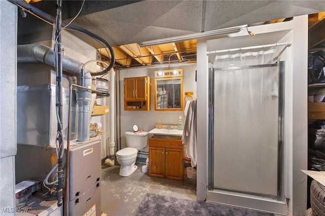 1536-1548 Montclair St NE, Warren, OH 44483 - full bath with unfinished concrete floors, vanity, a stall shower, and toilet