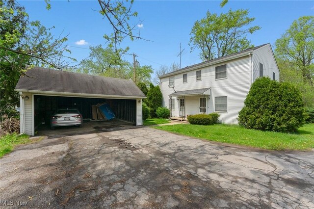 1536-1548 Montclair St NE, Warren, OH 44483 - view of front of property featuring an outbuilding and a front yard