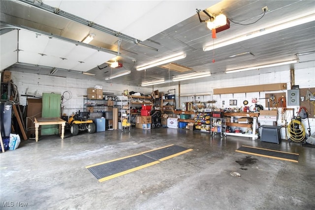 garage with a workshop area