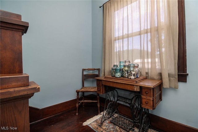 home office with wood finished floors