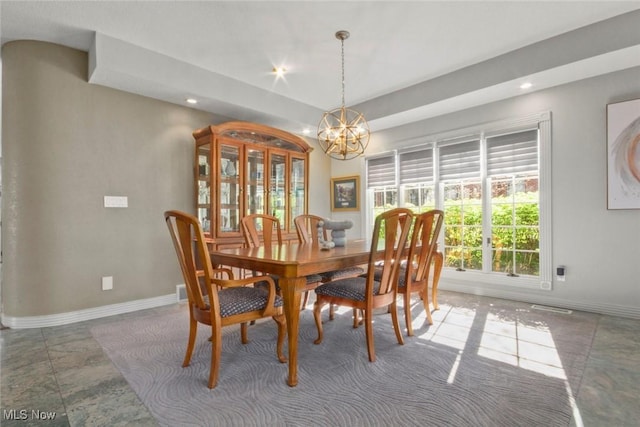 dining area with an inviting chandelier, baseboards, visible vents, and recessed lighting