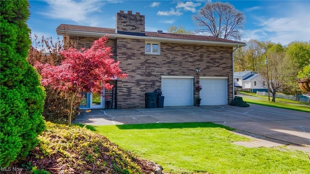 view of property exterior featuring a lawn, a garage, a chimney, and driveway