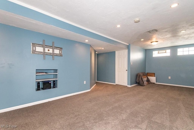 basement with recessed lighting, baseboards, and carpet floors