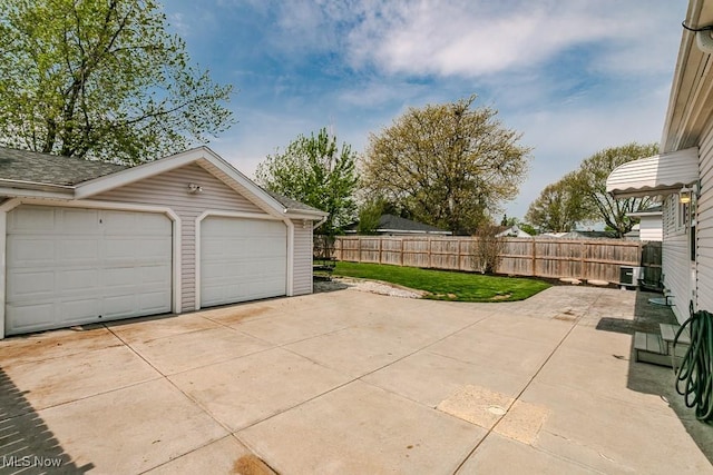 detached garage with fence